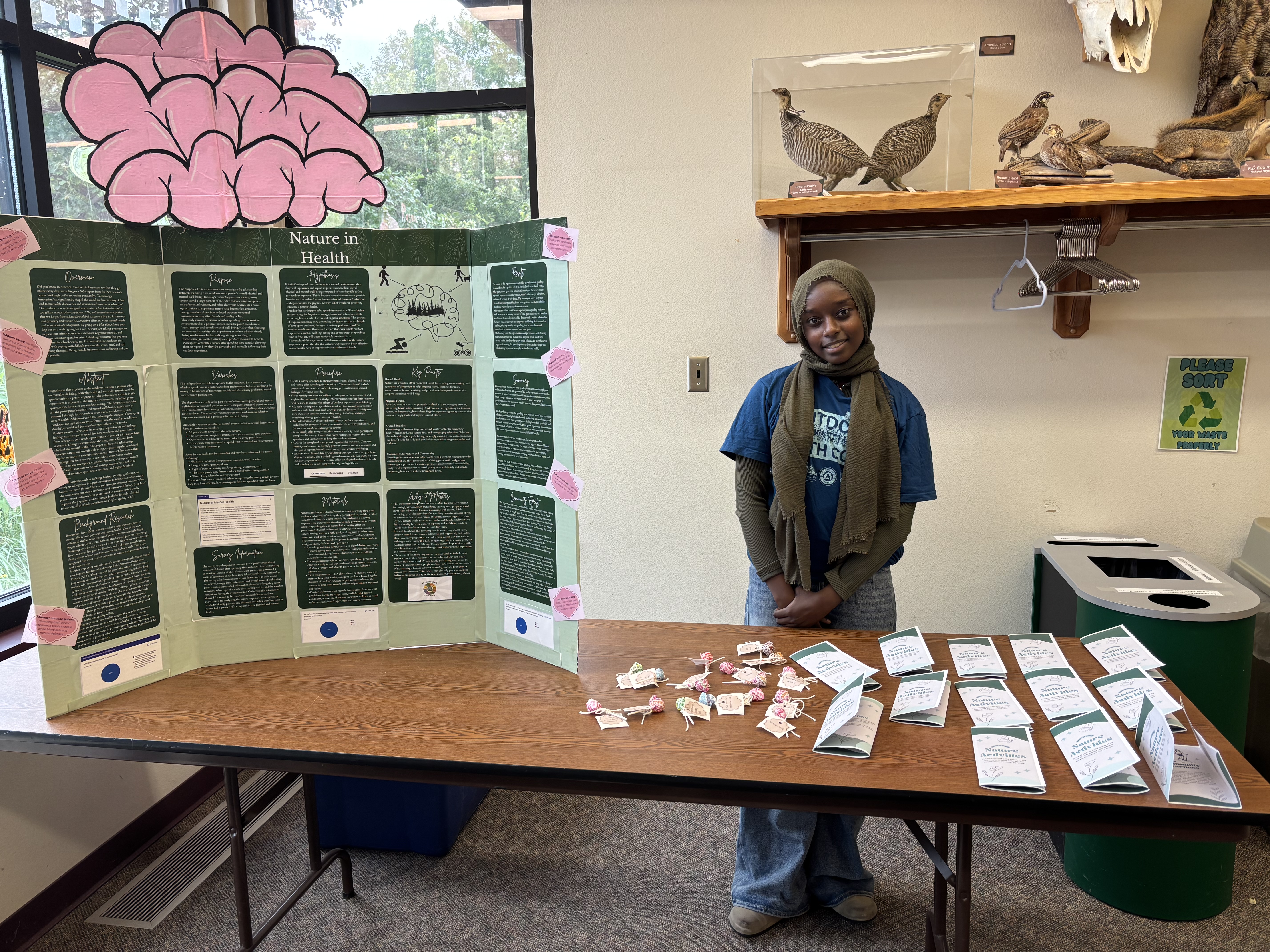 Teen presenting a project through the YES program